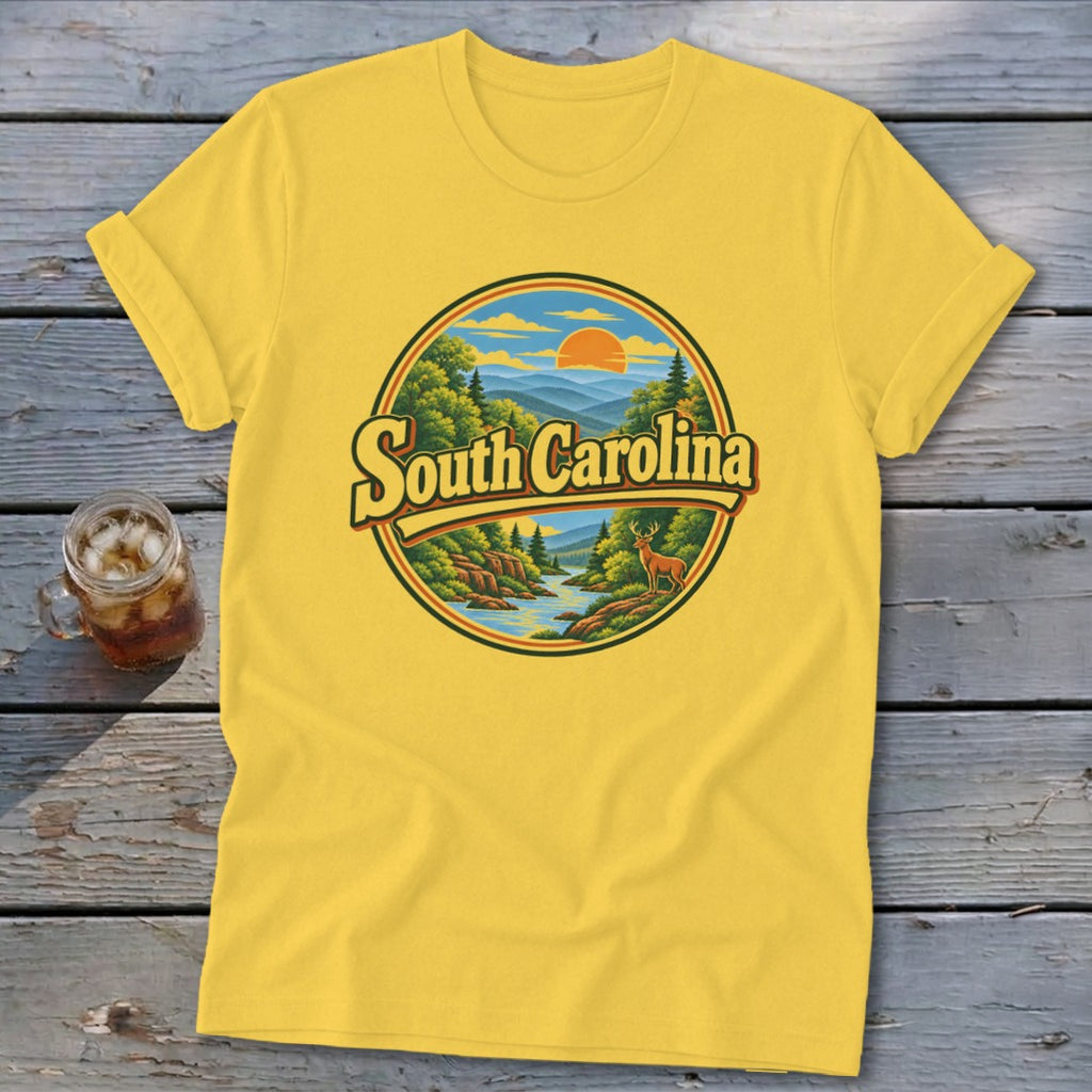 Yellow t-shirt with circular graphic of South Carolina landscape, river, deer, and sunset.