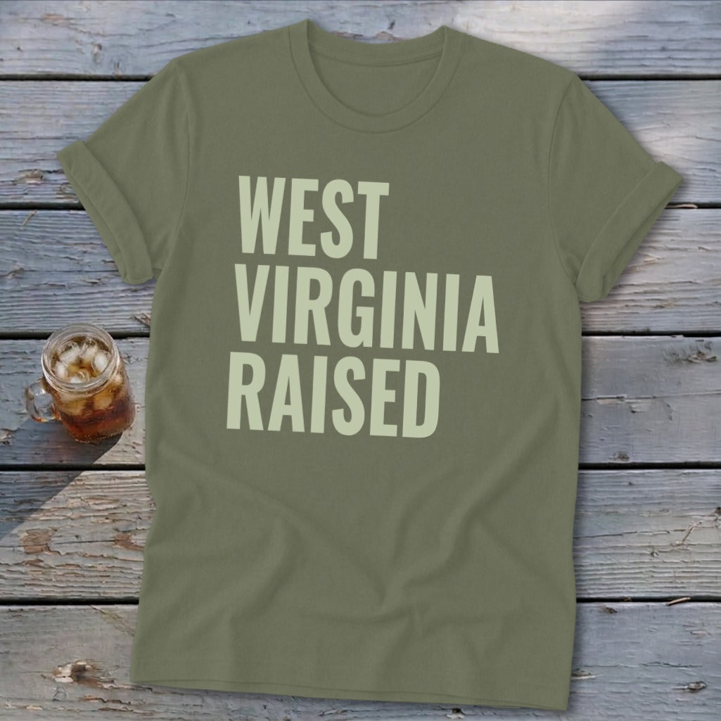 Olive green t-shirt with "WEST VIRGINIA RAISED" text in light green.