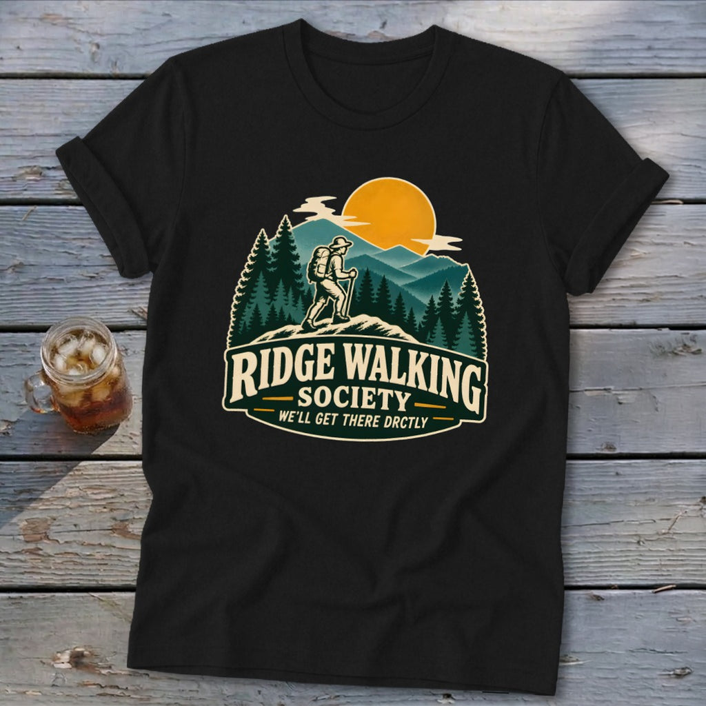 Black t-shirt with "Ridge Walking Society" logo featuring a hiker, mountains, trees, and sun.