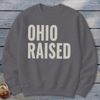 Grey crewneck sweatshirt with "OHIO RAISED" printed in light beige text.