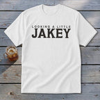 White t-shirt with "LOOKING A LITTLE JAKEY" printed in black.