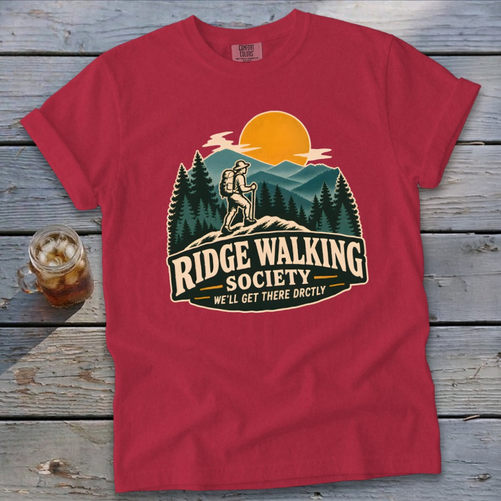 Red t-shirt with "Ridge Walking Society" graphic of a hiker and mountains.