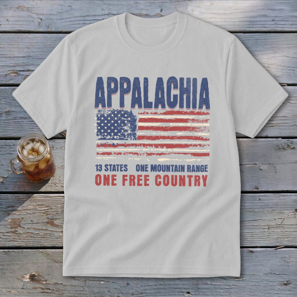 A light gray t-shirt with a vintage Appalachian graphic featuring an American flag and patriotic text.