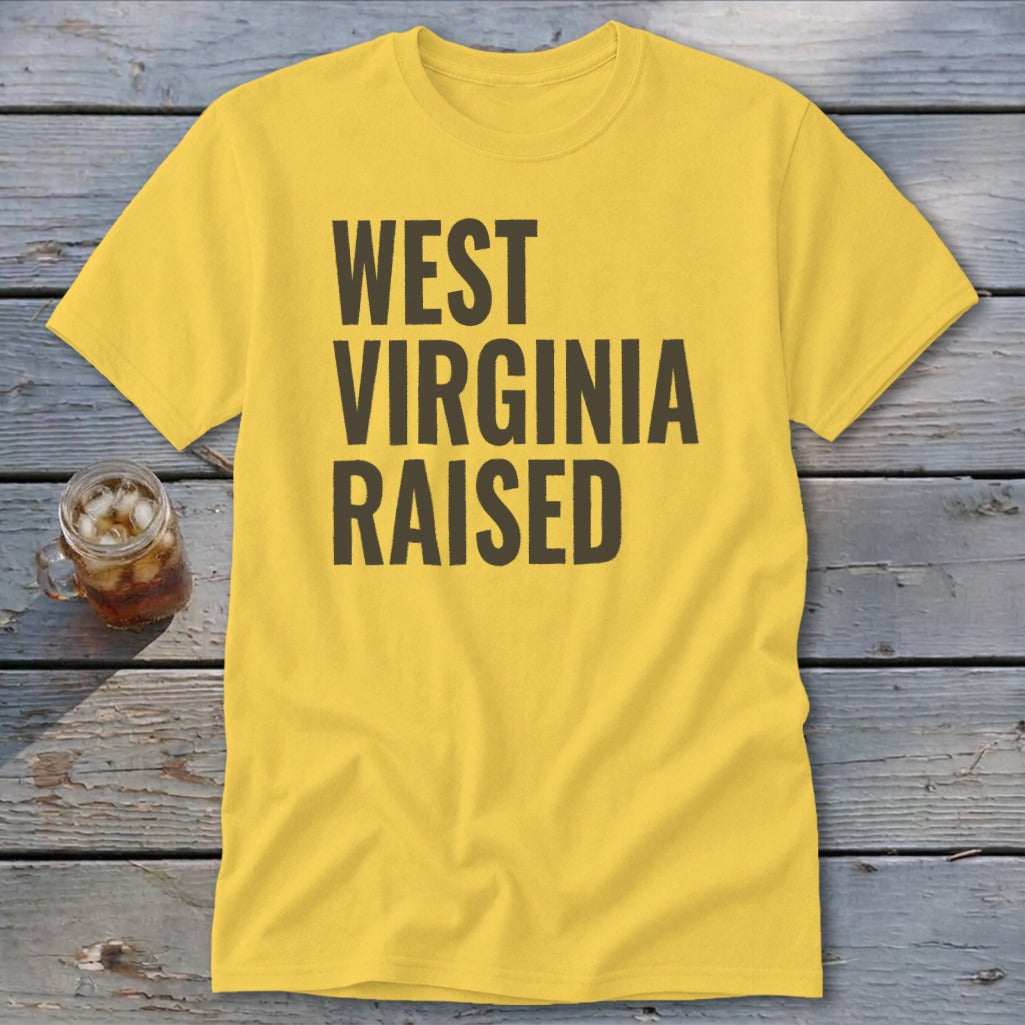 Yellow t-shirt with "WEST VIRGINIA RAISED" printed in dark gray.