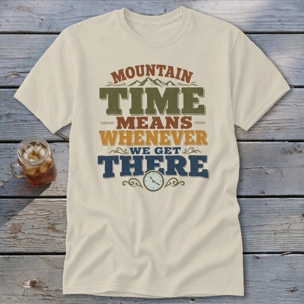 Cream t-shirt with "Mountain Time Means Whenever We Get There" graphic and clock.