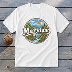 White t-shirt with a circular graphic depicting Maryland landscape and text.