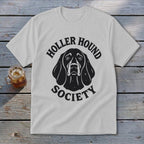 White t-shirt with black "Holler Hound Society" text and dog illustration.