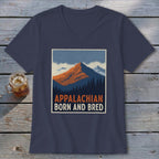 A navy blue V-neck t-shirt featuring a retro graphic of mountains and the text Appalachian Born and Bred.