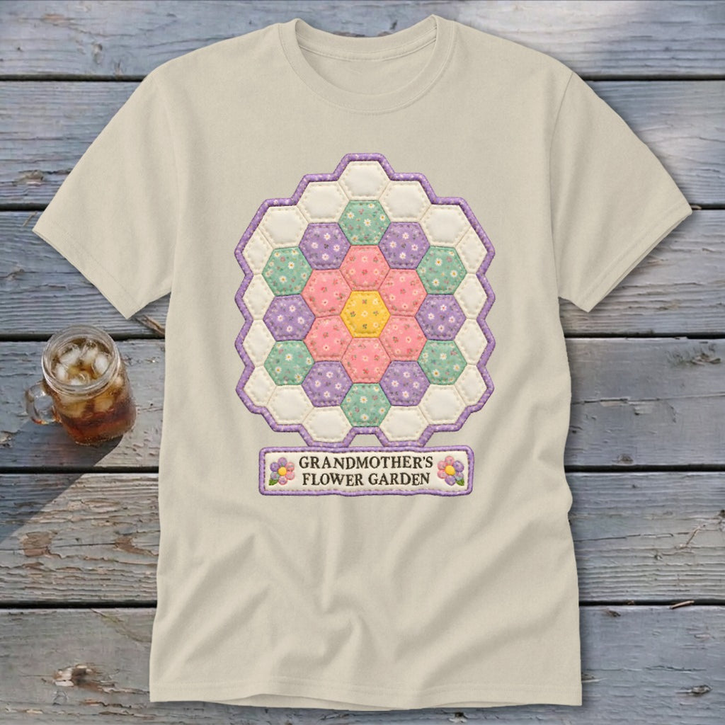 Cream t-shirt with a hexagonal patchwork flower design and text "GRANDMOTHER'S FLOWER GARDEN".