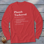 Red long-sleeve shirt with "Plumb Tuckered" definition printed in white.