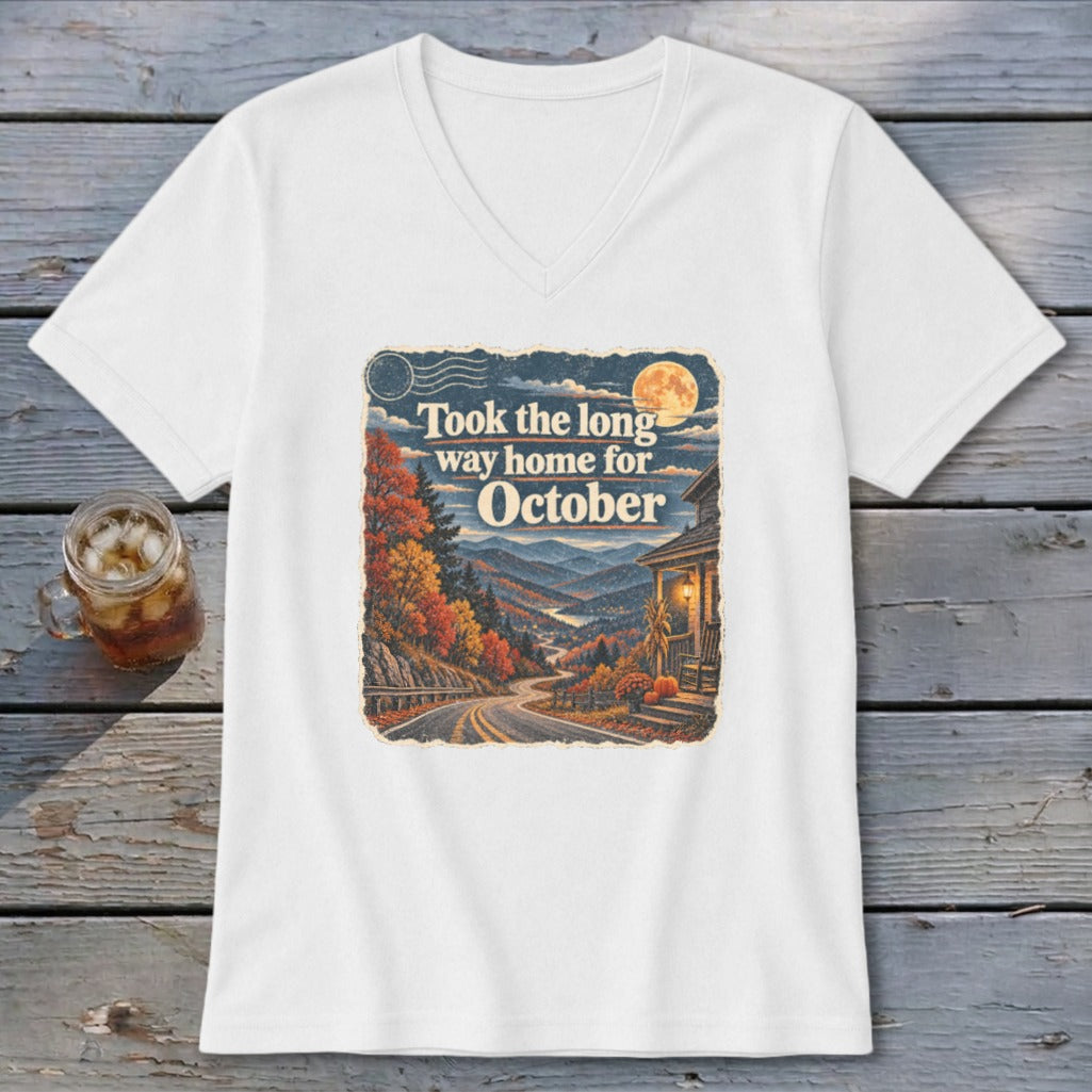 White v-neck t-shirt with "Took the long way home for October" graphic.