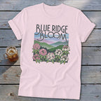 Pink t-shirt with "Blue Ridge Bloom" text and mountain and flower graphic.
