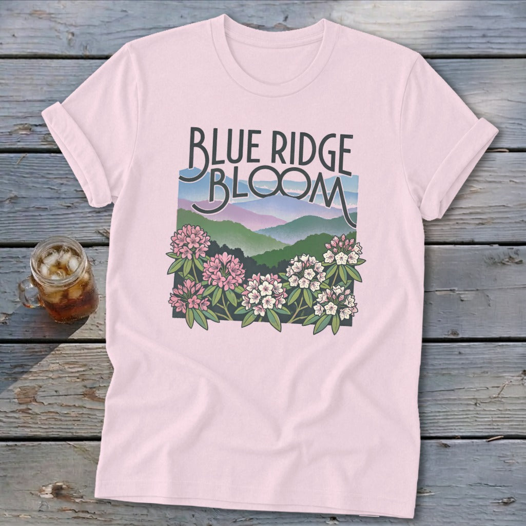Pink t-shirt with "Blue Ridge Bloom" text and mountain and flower graphic.
