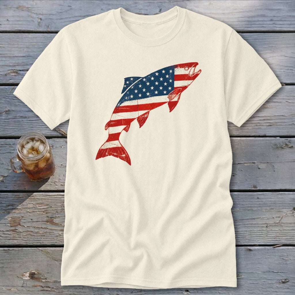 An off-white short-sleeved t-shirt featuring a leaping fish graphic patterned with the American flag.