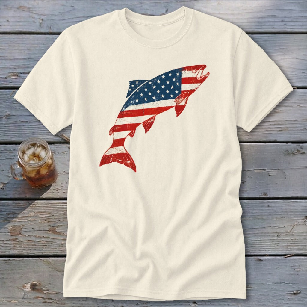 An off-white short-sleeved t-shirt featuring a leaping fish graphic patterned with the American flag.