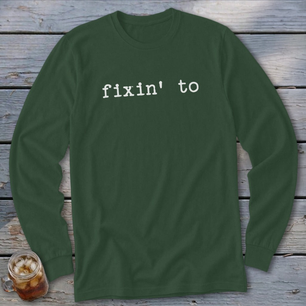 Green long-sleeve shirt with white text "fixin' to".