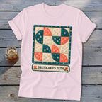 Pink t-shirt with a quilt design and "Drunkard's Path" text.