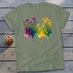 Green t-shirt with watercolor purple thistles and yellow wildflowers.