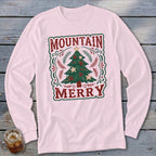 Light pink long-sleeve shirt with a festive Christmas tree graphic and the text Mountain Merry.