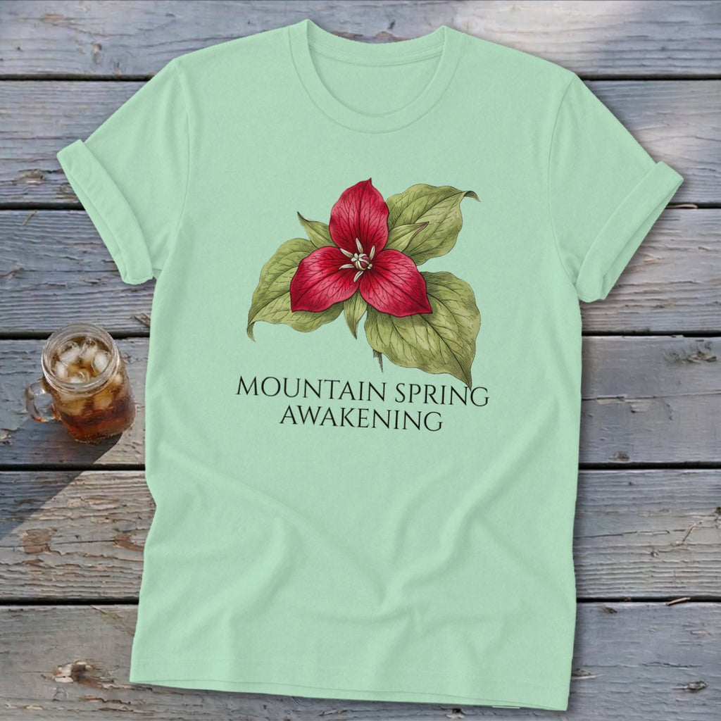 Light mint t-shirt with a red trillium flower and text "MOUNTAIN SPRING AWAKENING".