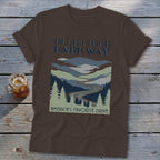 A brown t-shirt featuring a Blue Ridge Parkway mountain graphic and the text America's Favorite Drive.