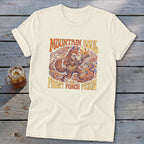 Cream t-shirt with graphic of a fox playing a guitar with text "Mountain Soul and Front Porch Pickin'".