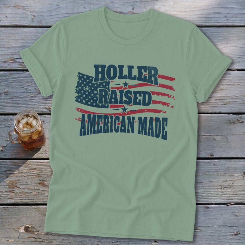 Light green t-shirt with distressed American flag graphic and text "Holler Raised American Made".