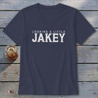 Navy v-neck t-shirt with white text "LOOKING A LITTLE JAKEY".