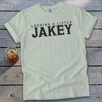 Light green t-shirt with "LOOKING A LITTLE JAKEY" text in black.