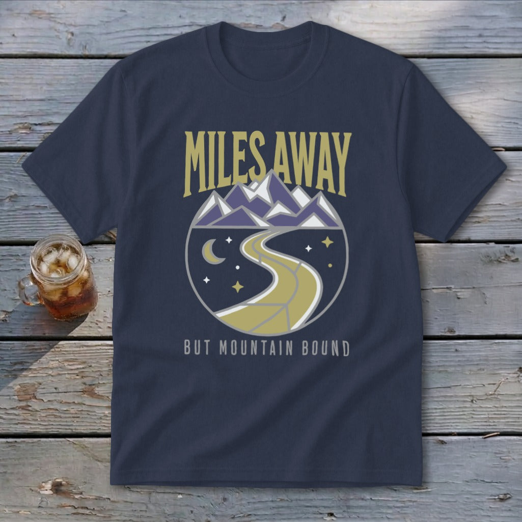 Navy t-shirt with "Miles Away But Mountain Bound" text and mountain road graphic.