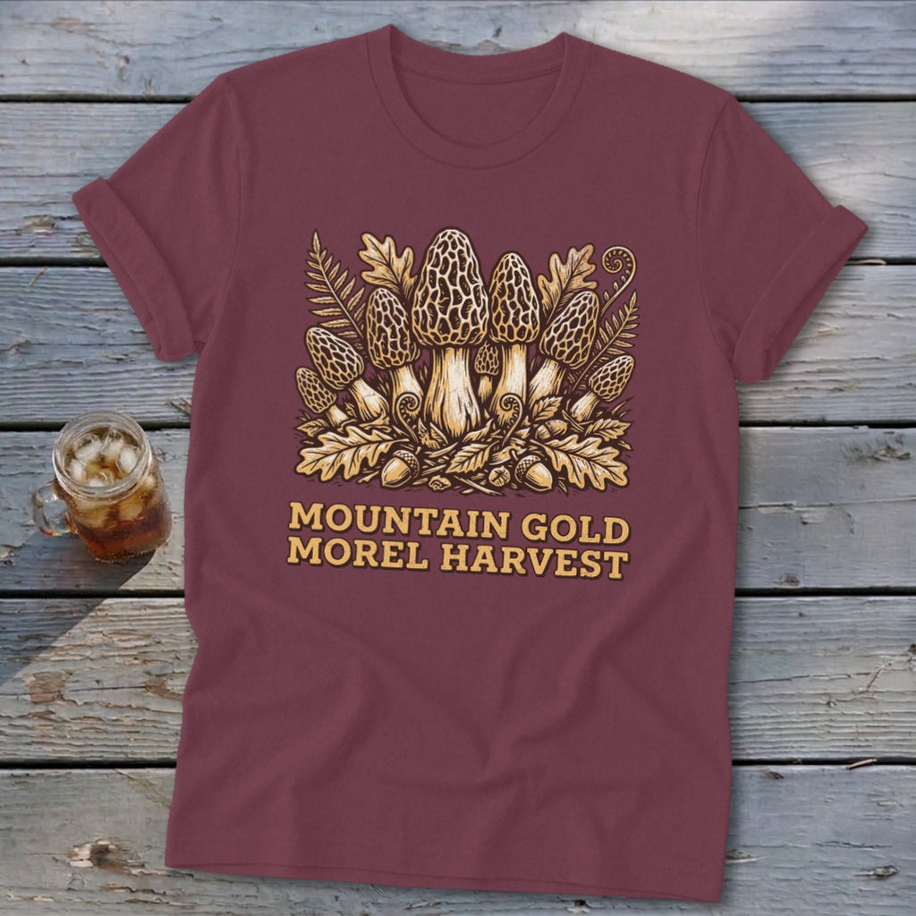 Maroon t-shirt with illustration of morel mushrooms, leaves, acorns, and text.