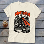 Cream t-shirt with black Mothman graphic and orange text.