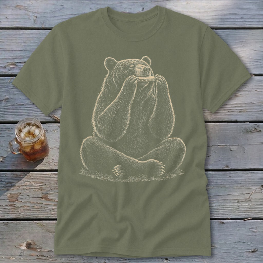 Bear playing a harmonica, depicted in a linework style on a green t-shirt.