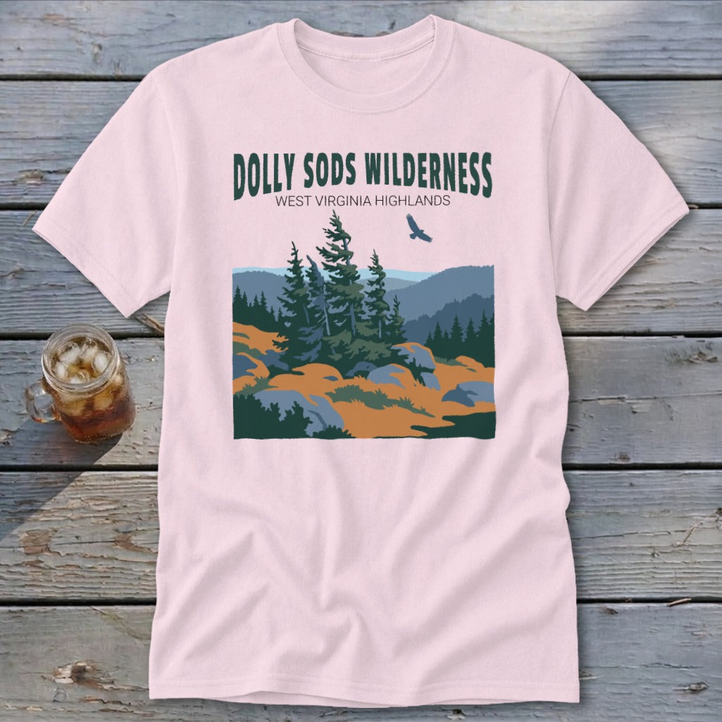 Light pink t-shirt featuring a green graphic of Dolly Sods Wilderness with pine trees and mountains.