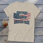 T-shirt with distressed American flag graphic and "Kentucky Raised American Made" text.