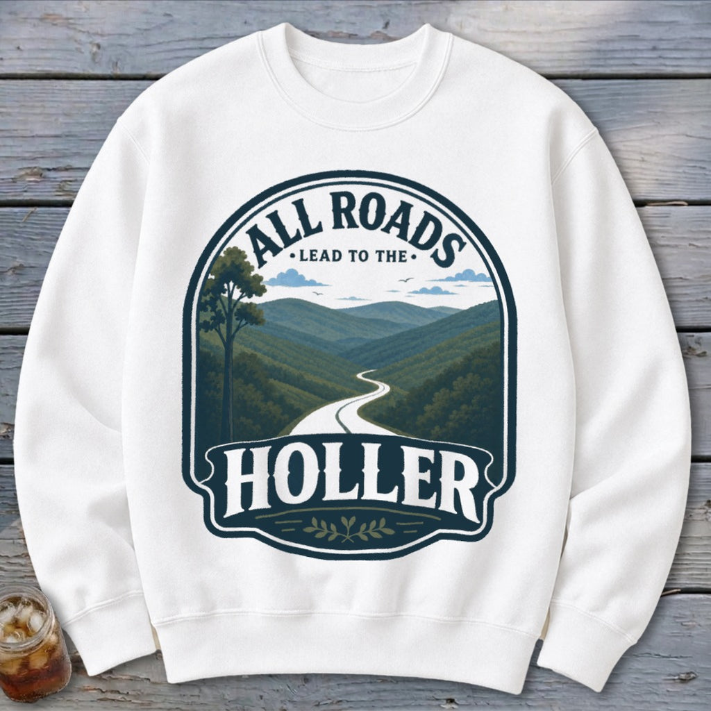 White sweatshirt with "All Roads Lead to the Holler" text and mountain landscape graphic.