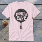 Pink t-shirt with cast iron skillet graphic and text "Cornbread Ain't Cake".