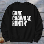 Black crewneck sweatshirt with "GONE CRAWDA HUNTHIN'" in white block lettering.