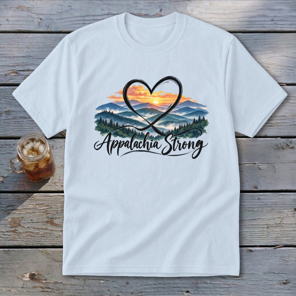Light blue t-shirt with a heart-shaped mountain sunset design and "Appalachia Strong" text.