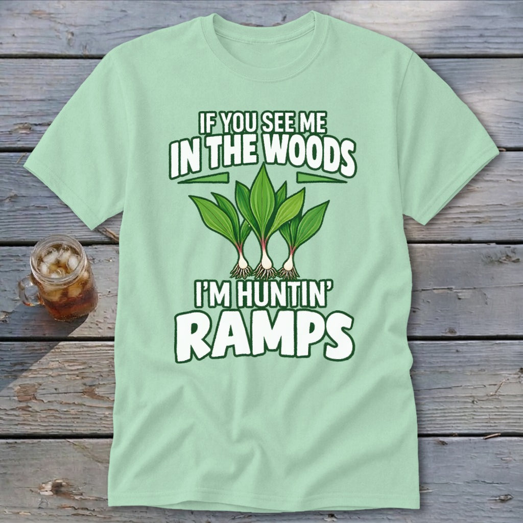 A light green t-shirt with an illustration of ramps and the text IF YOU SEE ME IN THE WOODS I'M HUNTIN' RAMPS.