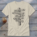 A beige t-shirt featuring a black graphic of a wooden signpost with directional text.