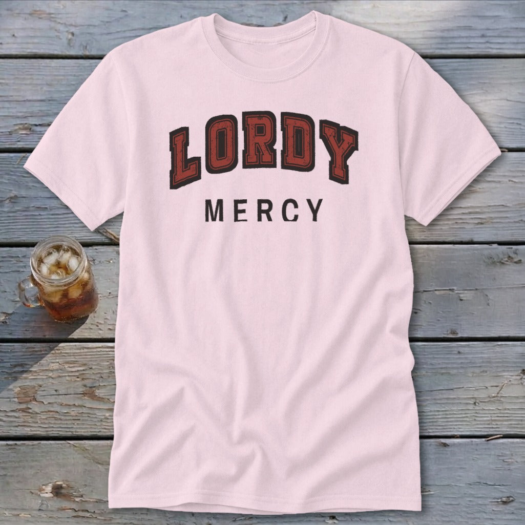 Pink t-shirt with "LORDY MERCY" text in distressed red and black font.