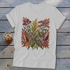 White t-shirt with a colorful floral and leaf illustration on the chest.