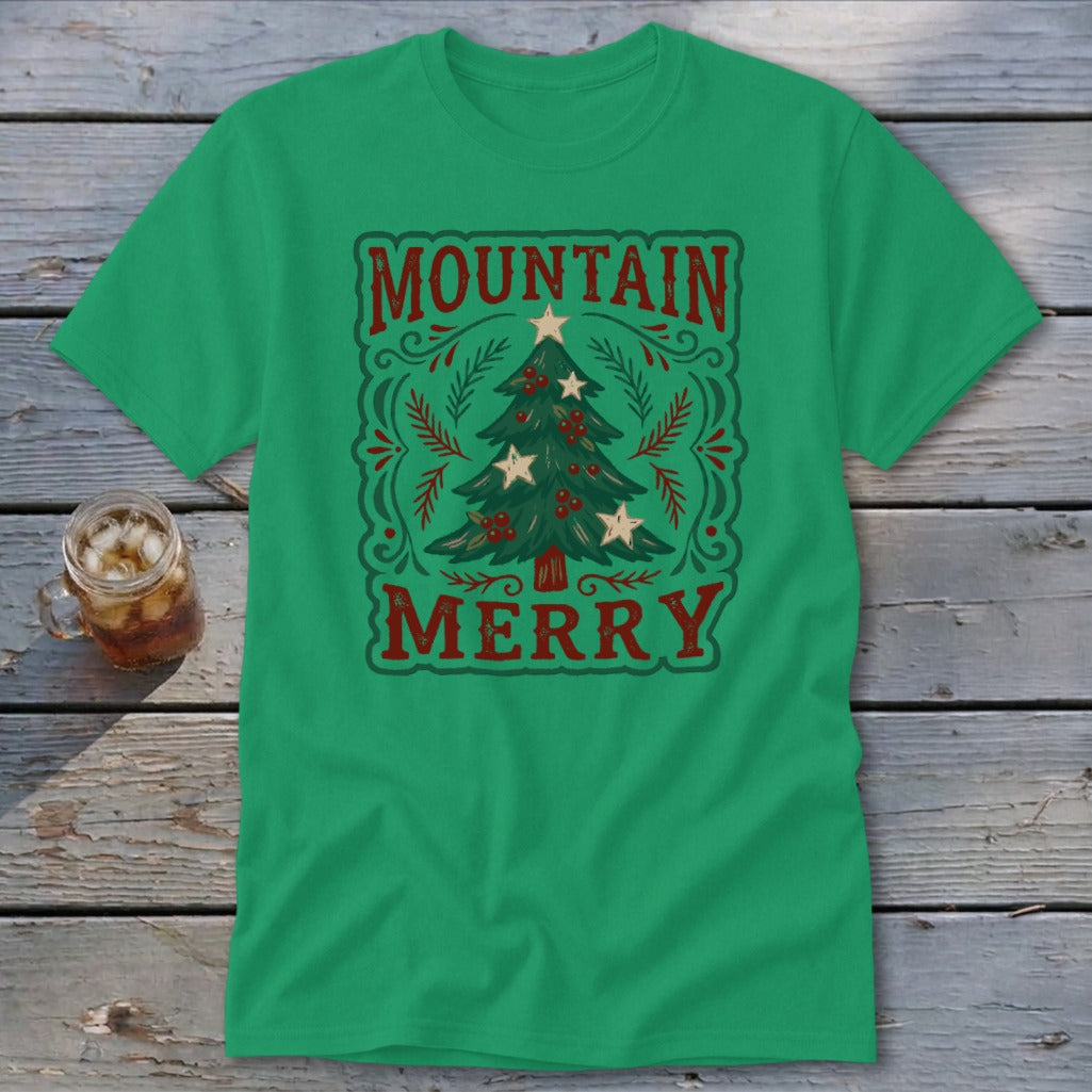 Green short-sleeve t-shirt featuring a vintage Christmas tree graphic with the text Mountain Merry.