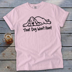 Light pink crewneck t-shirt featuring a black line drawing of a resting hound dog and the text That Dog Won't Hunt.