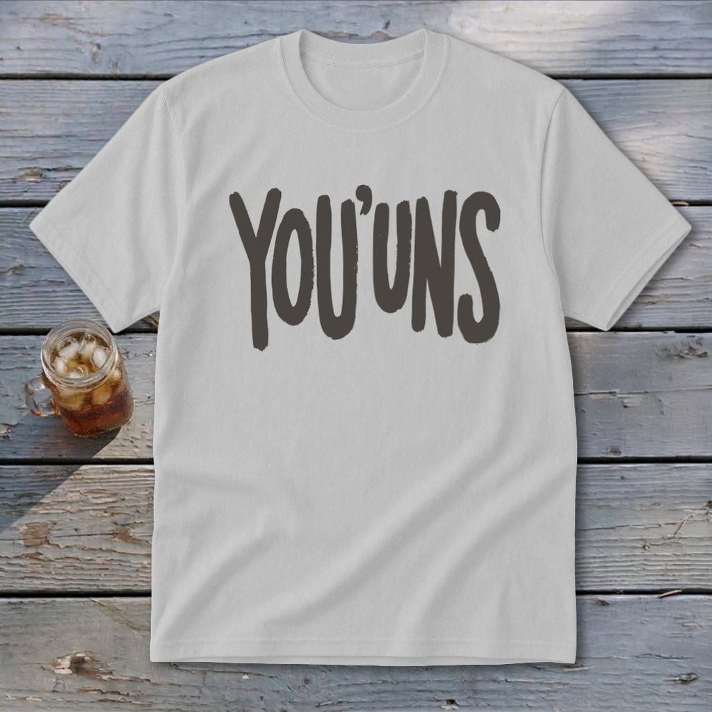 White t-shirt with the text "YOU'UNS" in dark gray lettering.
