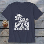 Navy v-neck t-shirt with white graphic of a house, trees, and fence.