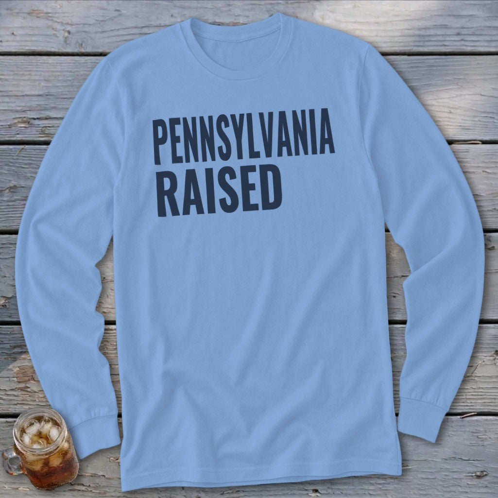 Light blue long-sleeve shirt with "PENNSYLVANIA RAISED" text.