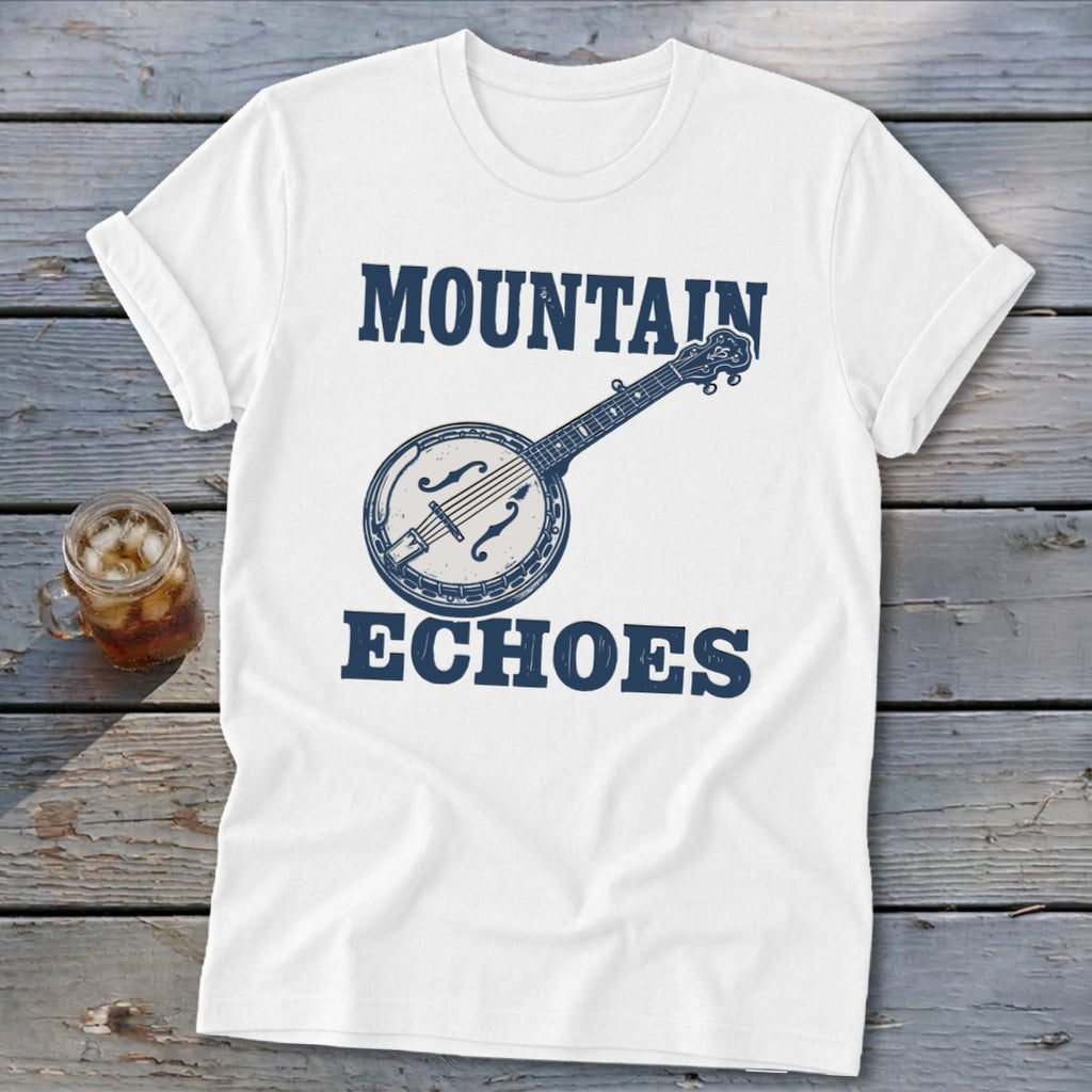 A white t-shirt featuring blue text that reads "MOUNTAIN ECHOES" and a banjo graphic.