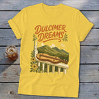 Yellow t-shirt with "Dulcimer Dreams" text, dulcimer, mountains, and flowers graphic.